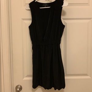 Mini black dress with open back